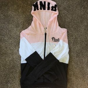 A women’s large PINK zip-up jacket